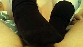 foot fetish with socks strokes cock... wow