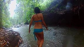 exotic couple fucks wildly in tropical rain, reaching orgasm deep in jungle