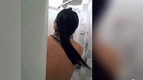 cute latina showering in the bathroom