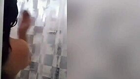 cute latina showering in the bathroom