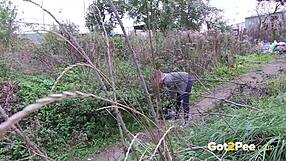 Pretty Girl Pees in Nature Outdoors