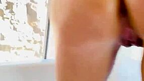 Watch Savanah Storm fuck that glass dildo in the tub!