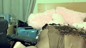 slowly undressing in front of the camera for a teasing striptease