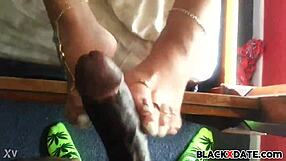 Does this black babe give excellent footjobs?