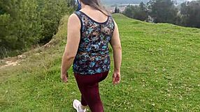 Amateur mother-in-law exhibits in the forest with stepson