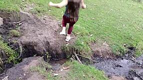 Amateur mother-in-law exhibits in the forest with stepson