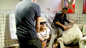 yo, that tied bitch gets used rough by two guys in a dirty spot