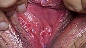 the fat preggo cunt is cumming while spanking her wet pussy and squirting cum everywhere