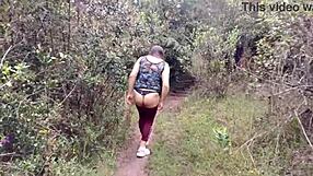 Amateur mother-in-law exhibits in the forest with stepson