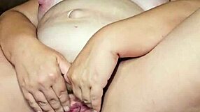 the fat preggo cunt is cumming while spanking her wet pussy and squirting cum everywhere