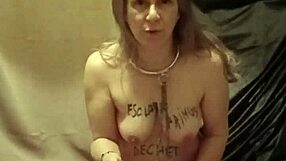 feeling the pain and submission as a slave endures belt strikes