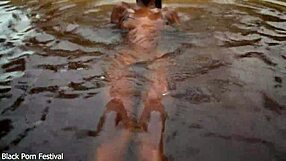 Skinny dark-skinned african hottie teases in the water