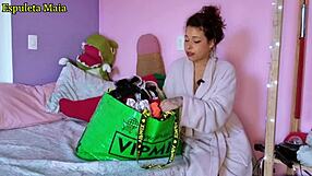 hot brazilian brunette showing off her stash of panties and lingerie