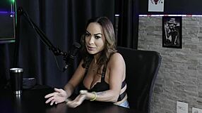 Scene from Rio Louco where she raffles fans for fun with Kidbengala and Belinha Baracho in sheer red