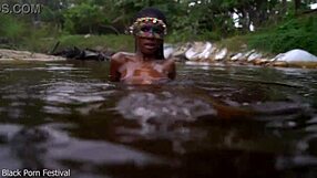 Skinny dark-skinned african hottie teases in the water