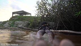 Skinny dark-skinned african hottie teases in the water