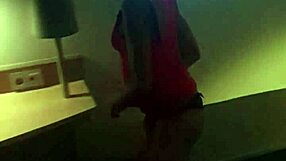 Mature fit mistress performs a detailed striptease, undressing slowly and seductively.