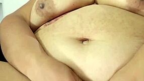My big pussy gapes wide. My BBW body and big tits contrast in this intense scene.