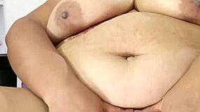 My big pussy gapes wide. My BBW body and big tits contrast in this intense scene.