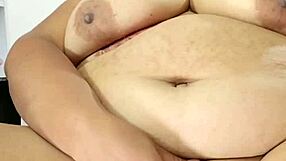 My big pussy gapes wide. My BBW body and big tits contrast in this intense scene.