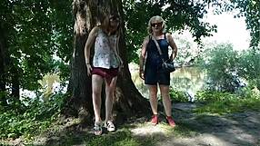Two ladies take a break by the road for a natural moment.