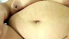 My big pussy gapes wide. My BBW body and big tits contrast in this intense scene.