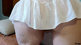 Stepmom struts housework in sheer dress flashing bare pussy and big ass