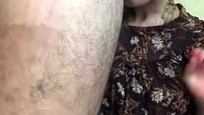 This depraved wife sucks two monster cocks in the sauna hall threesome.