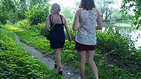Two ladies take a break by the road for a natural moment.