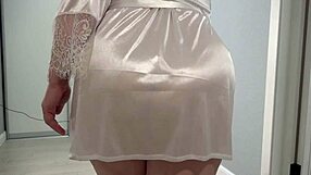 a home camera watches a mature housewife with a thick ass under a short robe and big boobs chubby milf behind the scenes pawg