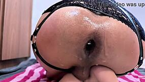 Shemale explores extreme anal with balloon and cage