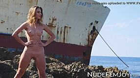 Beautiful Babe Teases Shaved Pussy And Natural Tits On Beach