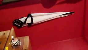 malisa's throat hints at deep pleasure off the bed's edge