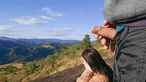 tour guide flashes cock to tourist up on the mountain
