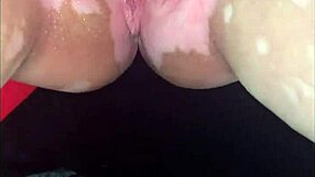 shaved beauty ties up fingers pussy to explosive squirting orgasms and tit play.
