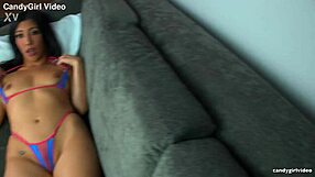 Lizzy Lust struts in tiniest micro bikini close-up