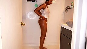 ebony model soaks jeans with messy wet pee fetish in shower