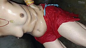 in the rural indian ranch bathroom the desi village bhabhi pisses then licks her clean shaved pussy for the first time