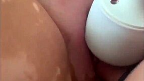 shaved beauty ties up fingers pussy to explosive squirting orgasms and tit play.