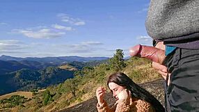 tour guide flashes cock to tourist up on the mountain