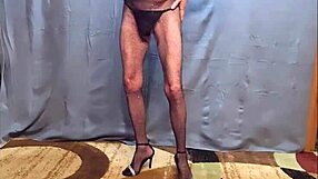 busy-bottom slips into sheer fishnet body stockings and killer heels for hd tease update 12