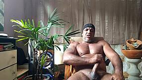 brazilian bear kojac strips down for a solo handjob tease in underwear