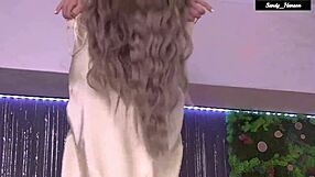 i love sandy hansons perky natural tits teasing in her sexy strip dance fingering