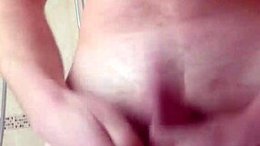 Why not bash those huge swinging balls while stroking that thick cock?