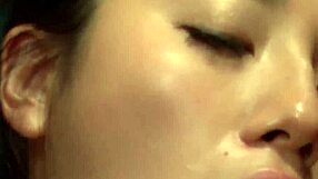 Oily Azusa Nagasawa Deep Throats Two Cumshots in Uncensored JAV Threesome