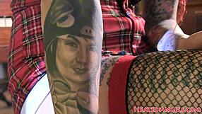 petite goth babe's pierced emo body poses teasingly during fetish modeling session