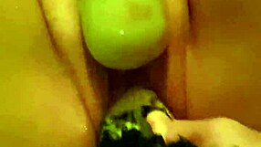 Woman fists her gaping cunt repeatedly stretching pussy wide open on camera