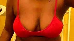 sexy ebony babe with bangs dances close-up shaking big ass before pissing pee stream