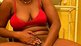 sexy ebony babe with bangs dances close-up shaking big ass before pissing pee stream