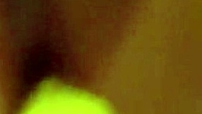 Woman fists her gaping cunt repeatedly stretching pussy wide open on camera